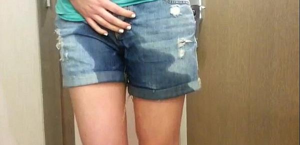  girl wets her jean shorts